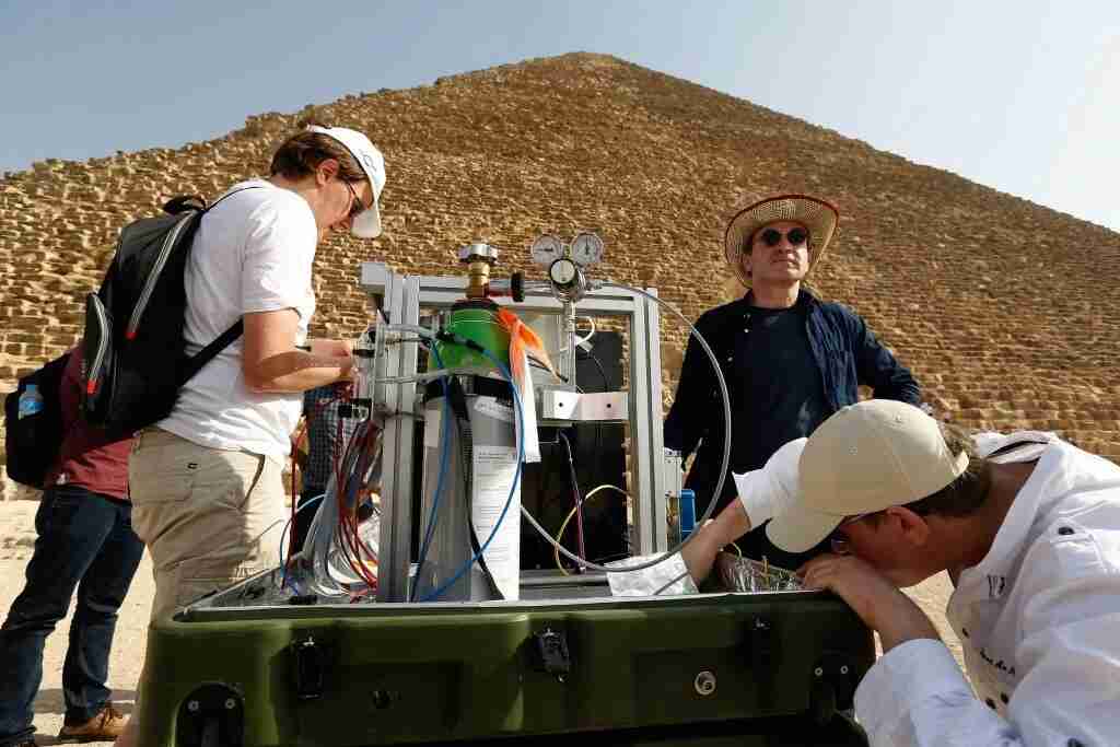 The muon telescope setup in front of the Great Pyramid of Giza. Photo courtesy of ScanPyramids.