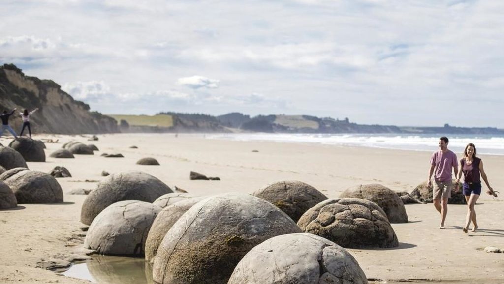 Tourists at Moeraki Boulders