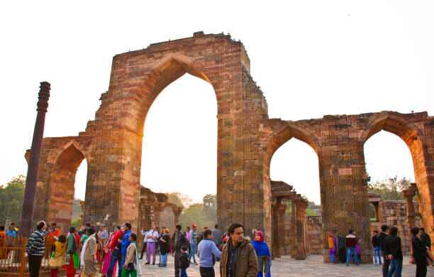 tourists visiting Iron Pillar of Delhi